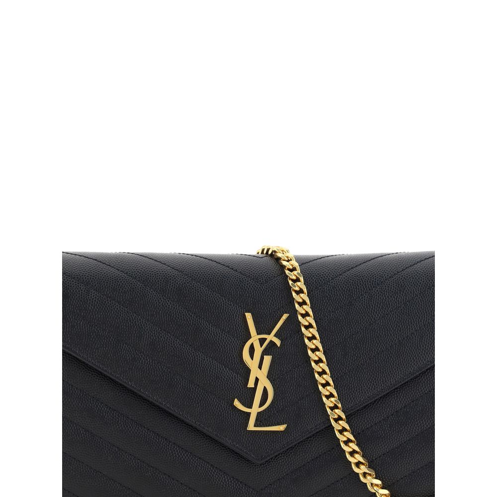 Black Calf Leather Bos Taurus Shoulder BagThe Monogram leather Shoulder Bag by Saint Laurent features a front snap-button closure for convenience and security. The leather design is enhanced by the matelassé print, which adds a sleek and sophisticated tex