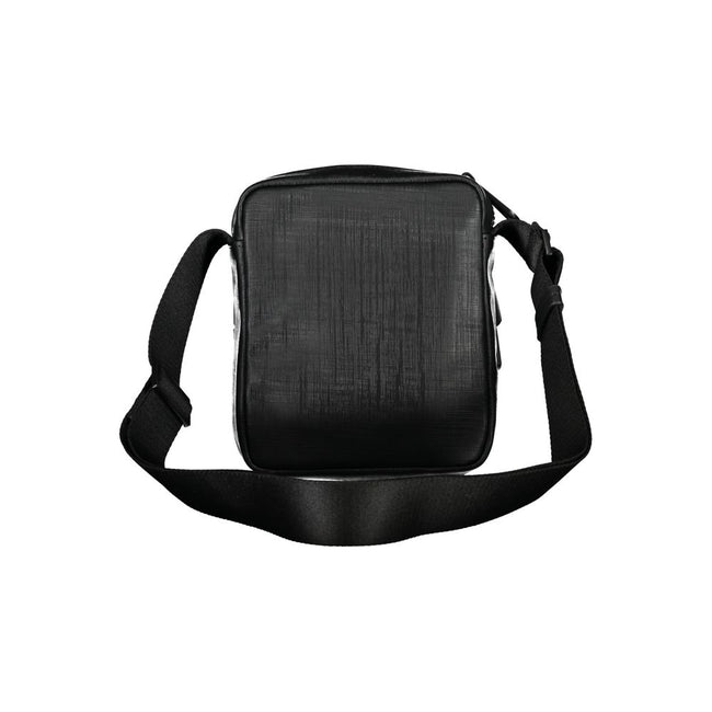Elegant Black Shoulder Bag with Contrasting DetailsExude sophistication with this sleek Calvin Klein shoulder bag, perfect for the modern man on-the-go. Featuring an adjustable shoulder strap for comfort, an external pocket for quick access essentials, an