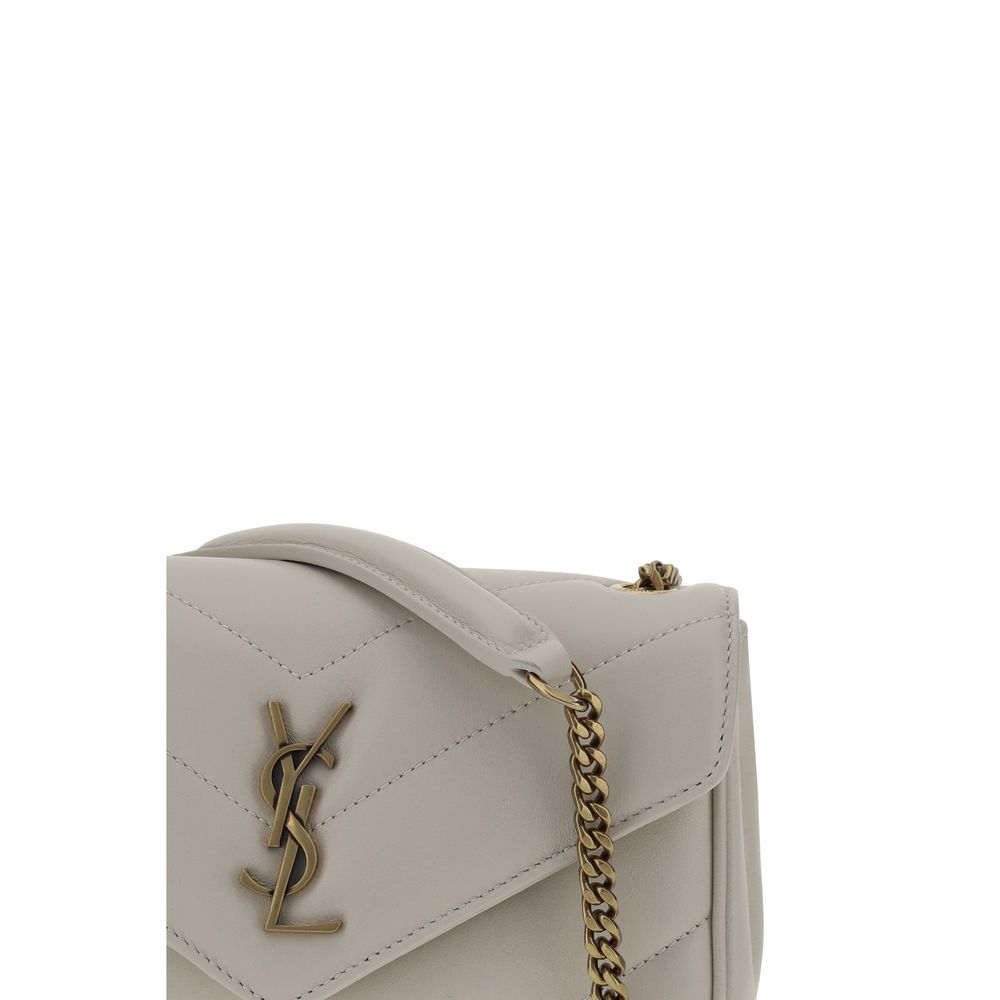 White Lamb Ovis Aries Aries Shoulder BagSaint Laurent’s Lou Lou lambskin Shoulder Bag is an elegant and sophisticated accessory. The quilted leather design is embellished with the iconic YSL logo plaque embossed on the front, while the front closure with