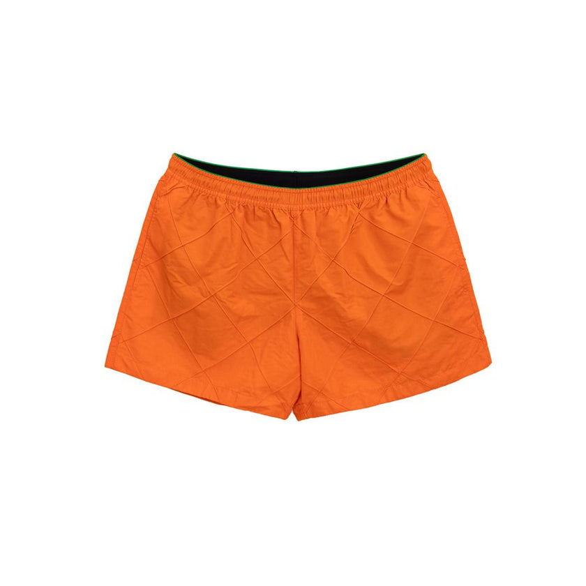 Orange Polyamide Swim ShortBottega Veneta Orange Weave Swim Trunks. Orange nylon boxer shorts with iconic weave pattern, elastic waistband with adjustable drawstring, two side pockets, internal mesh. Composition: 100% Polyamide Internal SKU: 25MAR101 Bran