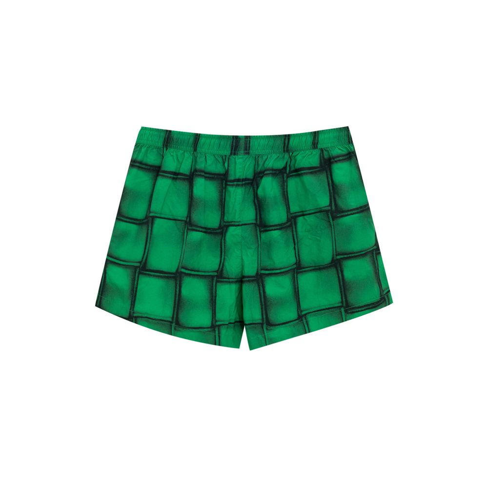 Green Polyamide Swim ShortsBoxer Swimsuit with Cassette Print Bottega Veneta. Green nylon boxer swimsuit with iconic Cassette print allover, elastic waist with adjustable drawstring, two side pockets, internal mesh. Composition: 100% Polyamide Internal SK