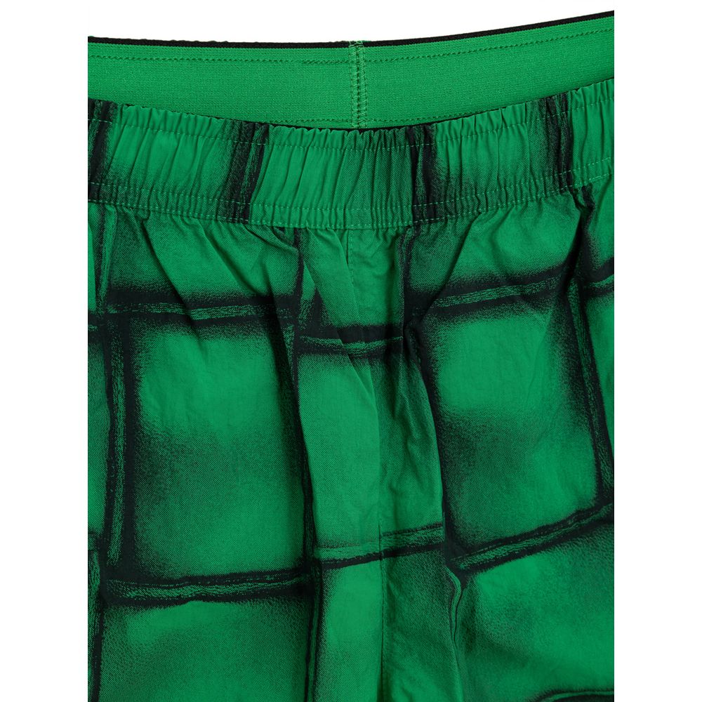 Green Polyamide Swim ShortsBoxer Swimsuit with Cassette Print Bottega Veneta. Green nylon boxer swimsuit with iconic Cassette print allover, elastic waist with adjustable drawstring, two side pockets, internal mesh. Composition: 100% Polyamide Internal SK