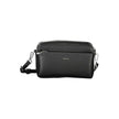 Black Polyester Women HandbagExperience the epitome of urban chic with Calvin Klein’s latest handbag creation. Designed for the modern fashionista, this sleek black bag boasts functionality and style. Featuring one removable shoulder handle and an adjusta