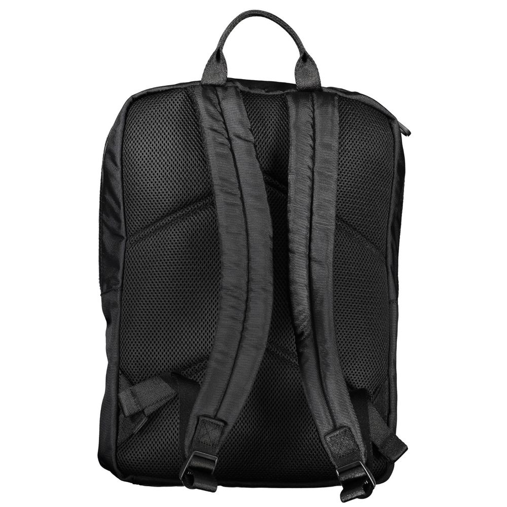 Elegant Polyester Laptop BackpackDiscover the perfect blend of functionality and style with this sophisticated backpack designed for the modern professional. Calvin Klein presents a premium laptop carrier that’s as sleek as it is practical, boasting adjus