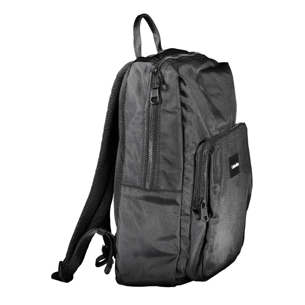 Elegant Polyester Laptop BackpackDiscover the perfect blend of functionality and style with this sophisticated backpack designed for the modern professional. Calvin Klein presents a premium laptop carrier that’s as sleek as it is practical, boasting adjus