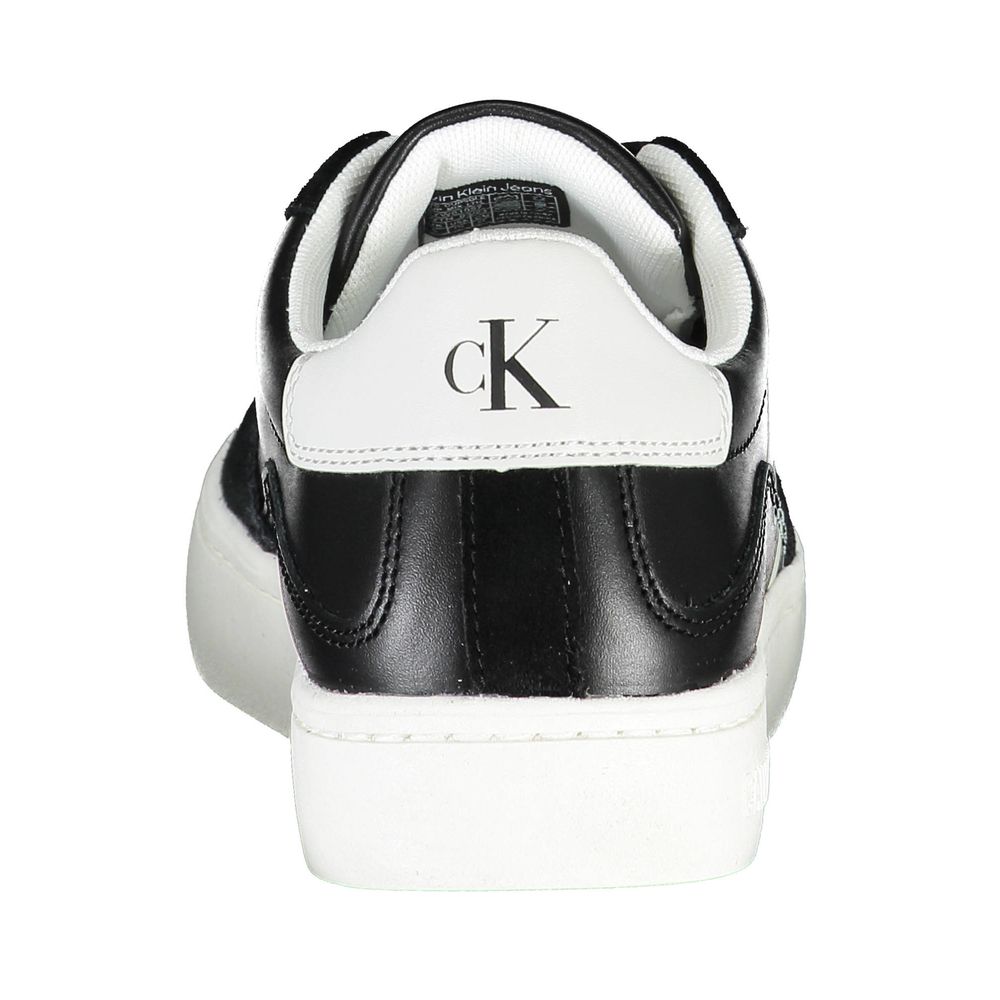 Sleek Black Lace-Up Sneakers With Contrast DetailsBreathe new life into your footgear collection with these sharp, lace-up sneakers from Calvin Klein. Flaunting eye-catching contrast details and the iconic logo, these shoes are not just a style statement