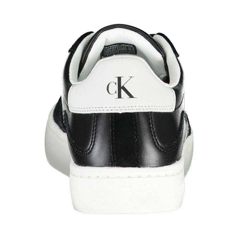 Sleek Black Lace-Up Sneakers With Contrast DetailsBreathe new life into your footgear collection with these sharp, lace-up sneakers from Calvin Klein. Flaunting eye-catching contrast details and the iconic logo, these shoes are not just a style statement