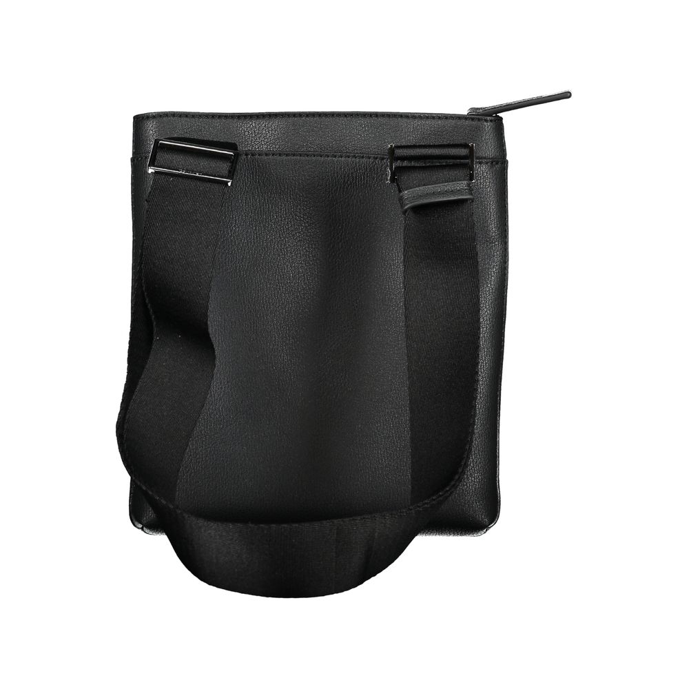 Elegant Black Shoulder Bag with Contrasting DetailsExperience the perfect blend of style and functionality with the Calvin Klein shoulder bag. Designed for the modern man on-the-go, this sleek bag features an adjustable shoulder strap for comfort, two han