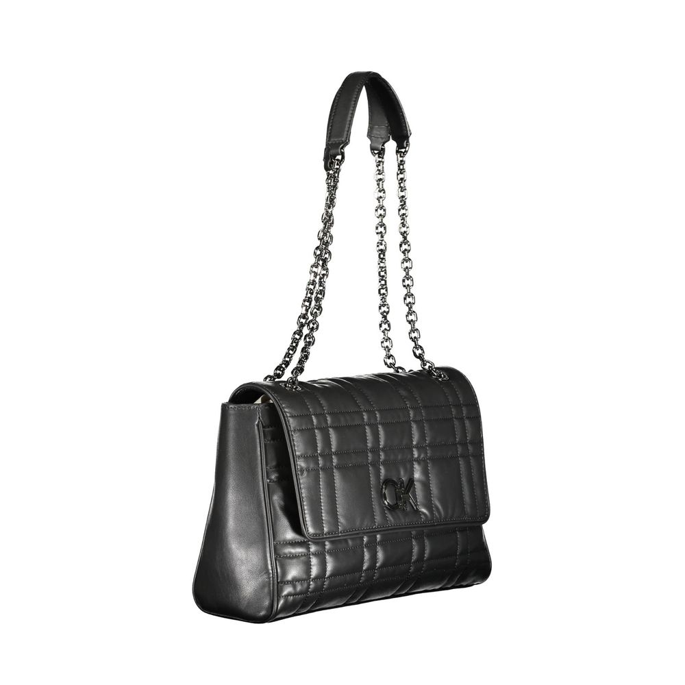 Black Polyester Women HandbagElevate your accessory game with the eco-conscious chic of this Calvin Klein handbag. Effortlessly versatile, it boasts a sleek black hue with contrasting details that add a pop of sophistication. Two chain handles provide a g