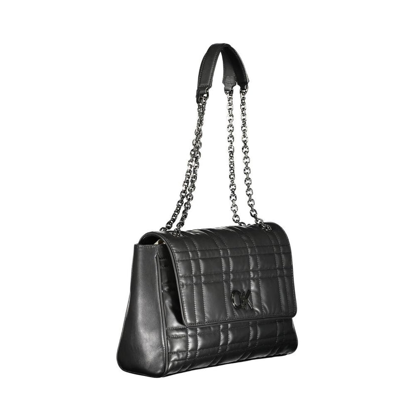 Black Polyester Women HandbagElevate your accessory game with the eco-conscious chic of this Calvin Klein handbag. Effortlessly versatile, it boasts a sleek black hue with contrasting details that add a pop of sophistication. Two chain handles provide a g