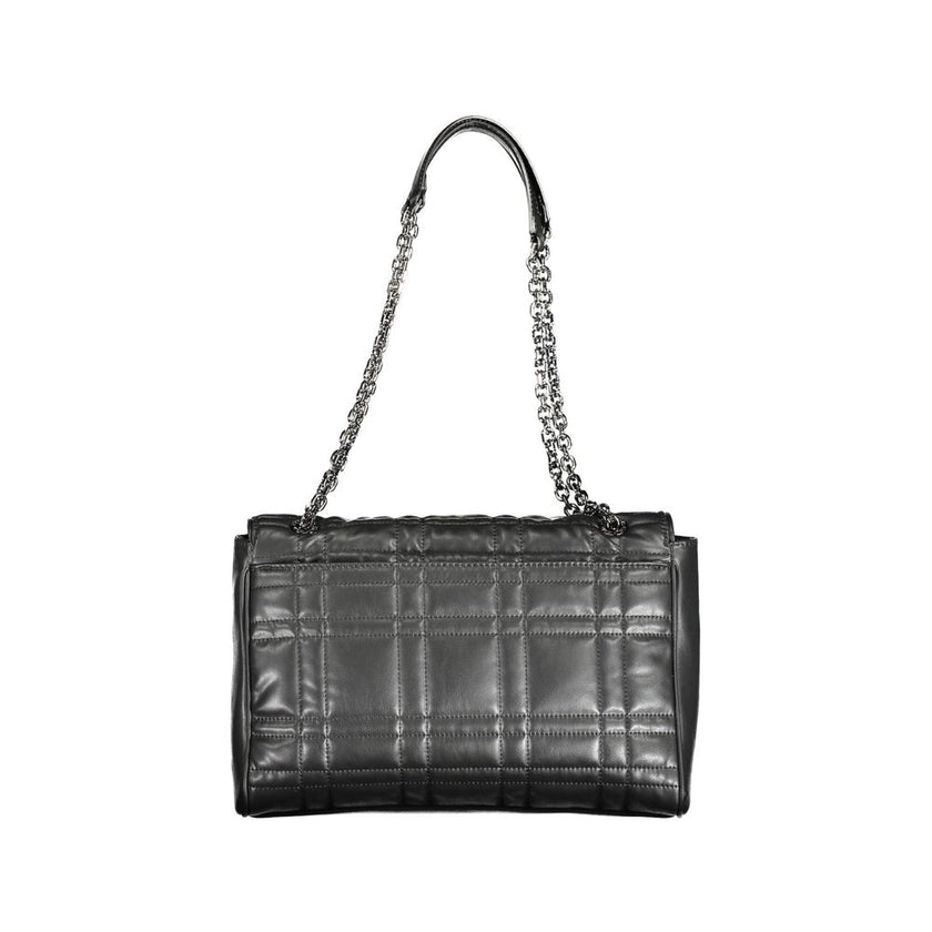 Black Polyester Women HandbagElevate your accessory game with the eco-conscious chic of this Calvin Klein handbag. Effortlessly versatile, it boasts a sleek black hue with contrasting details that add a pop of sophistication. Two chain handles provide a g