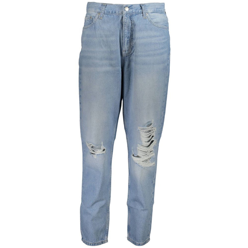 Blue Cotton Women JeansDive into the timeless elegance of Calvin Klein with these chic 5-pocket jeans, boasting a fashion-forward washed and worn effect that exudes sophistication. Precision-crafted with a button and zip closure, these jeans are both comf