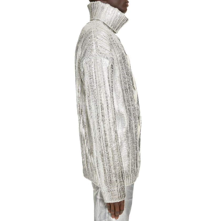 Brown Wool Men Turtleneck SweaterExperience the epitome of opulence with Balmain’s turtleneck sweater, masterfully crafted from a blend of virgin wool and lyocell. Its metallic-effect cable knit illuminates with every turn, while the stylishly dropped sho