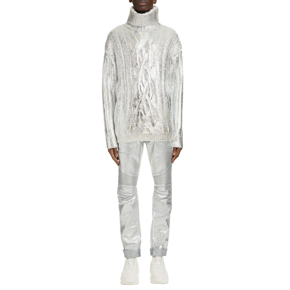Brown Wool Men Turtleneck SweaterExperience the epitome of opulence with Balmain’s turtleneck sweater, masterfully crafted from a blend of virgin wool and lyocell. Its metallic-effect cable knit illuminates with every turn, while the stylishly dropped sho