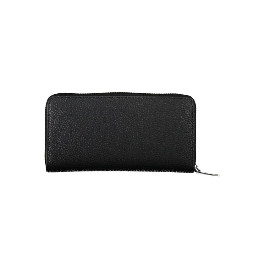 Black Polyester Women WalletElevate your accessory game with this sleek and sophisticated Calvin Klein wallet. Crafted for the modern women who appreciates minimalist elegance and functionality. With five compartments, a coin purse, and double card slots,