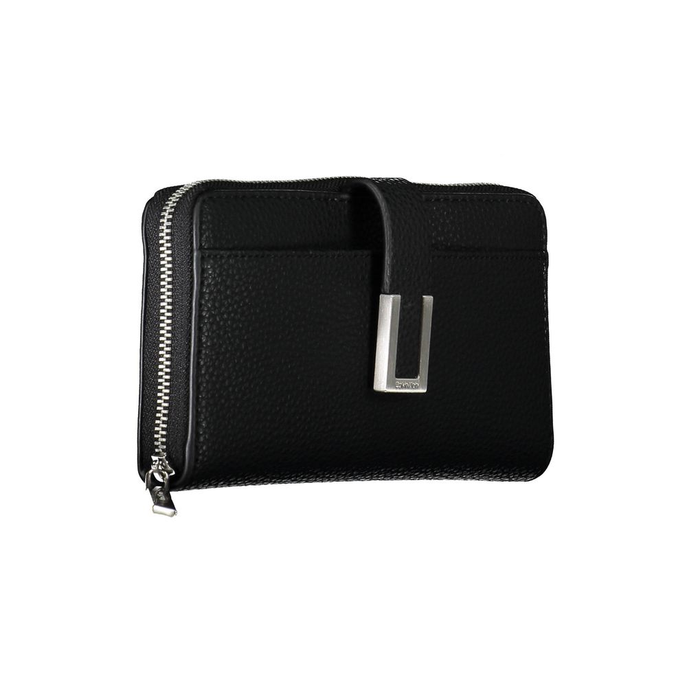 Black Polyester Women WalletElevate your accessory game with this sleek and sophisticated Calvin Klein wallet. Crafted for the modern women who appreciates minimalist elegance and functionality. With five compartments, a coin purse, and double card slots,