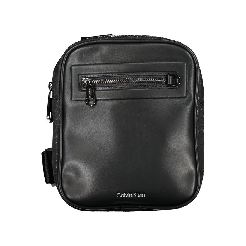 Sleek Urban Shoulder Bag with Contrast DetailsStep out in style with this sleek Calvin Klein shoulder bag, perfect for the modern man on-the-go. Its adjustable shoulder strap allows for comfortable wear while the contrasting details add a touch of sophist