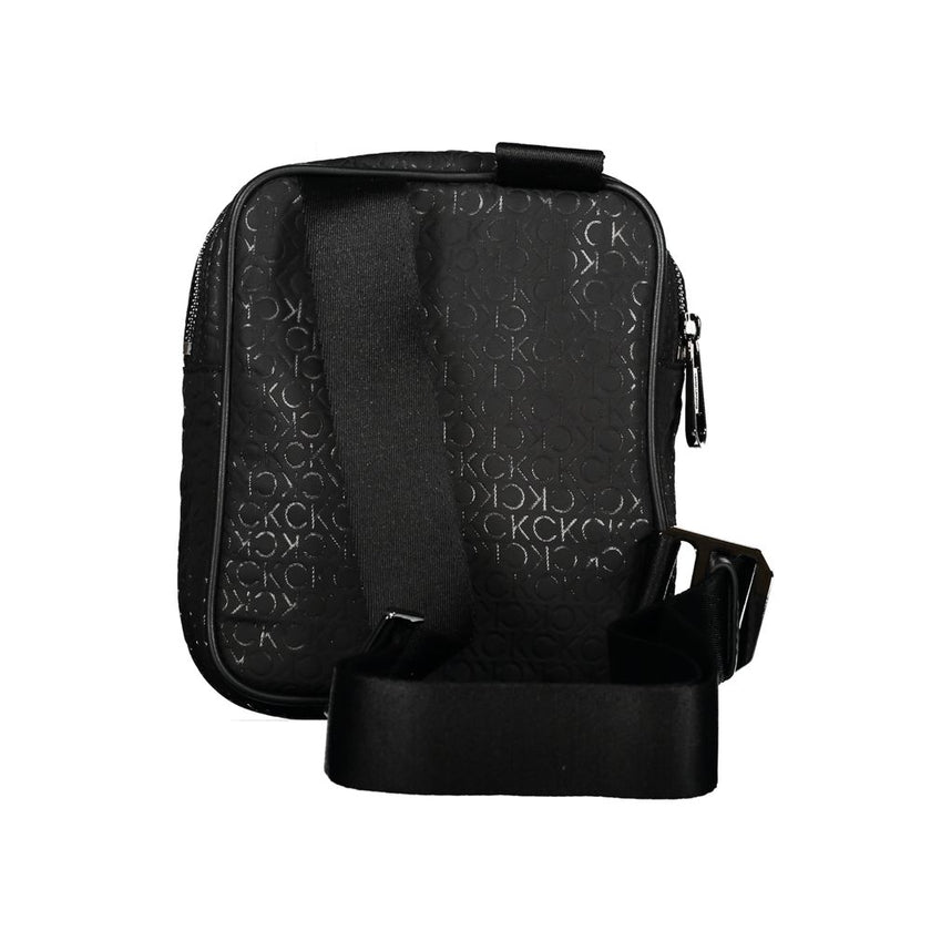 Sleek Urban Shoulder Bag with Contrast DetailsStep out in style with this sleek Calvin Klein shoulder bag, perfect for the modern man on-the-go. Its adjustable shoulder strap allows for comfortable wear while the contrasting details add a touch of sophist