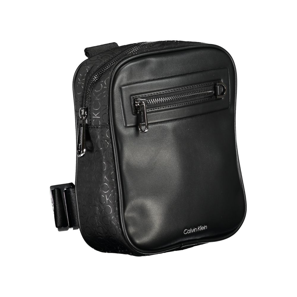 Sleek Urban Shoulder Bag with Contrast DetailsStep out in style with this sleek Calvin Klein shoulder bag, perfect for the modern man on-the-go. Its adjustable shoulder strap allows for comfortable wear while the contrasting details add a touch of sophist