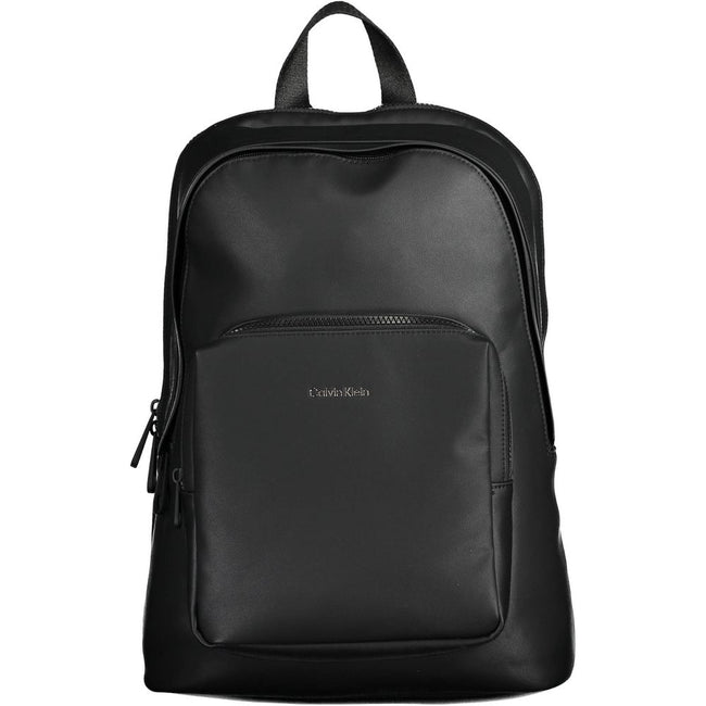Black Polyester Men BackpackElevate your on-the-go style with the Calvin Klein Essential Backpack, a blend of functionality and eco-friendly fashion. Crafted with 50% recycled materials, this sleek black accessory is a testament to modern design and susta