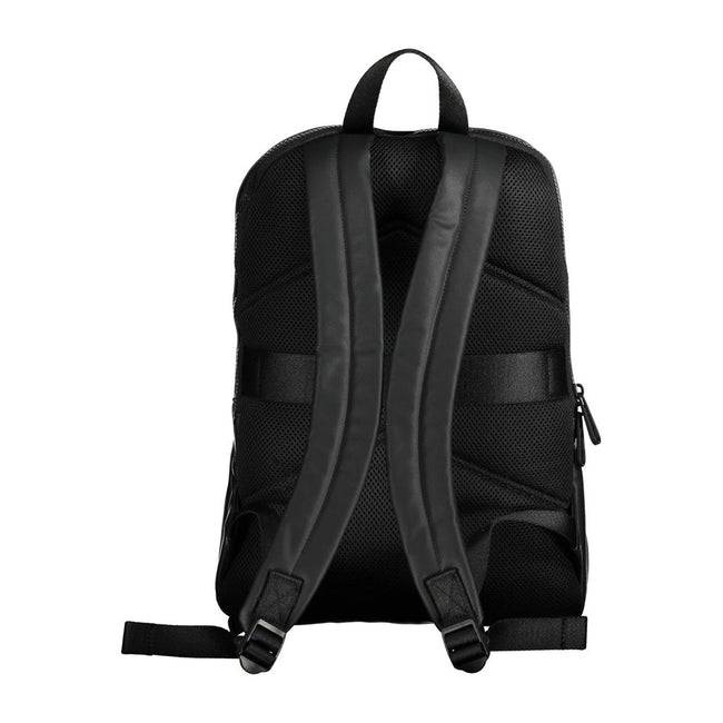 Black Polyester Men BackpackElevate your on-the-go style with the Calvin Klein Essential Backpack, a blend of functionality and eco-friendly fashion. Crafted with 50% recycled materials, this sleek black accessory is a testament to modern design and susta