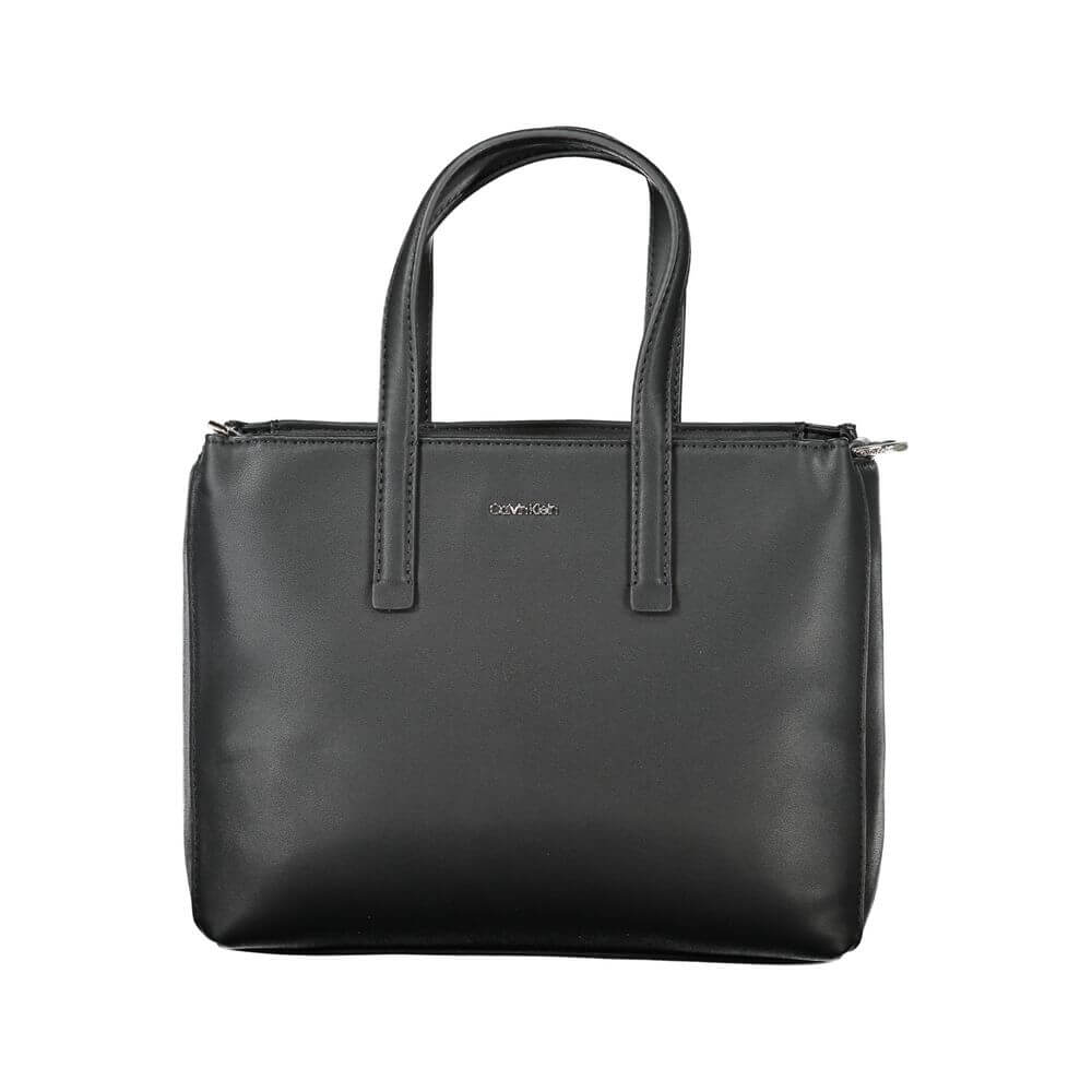 Black Polyester Women HandbagUnleash the epitome of urban-chic with the Calvin Klein masterpiece that seamlessly blends sustainability with style. Imagine the touch of sophistication with a bag that boasts dual handles for sheer elegance, a versatile adju