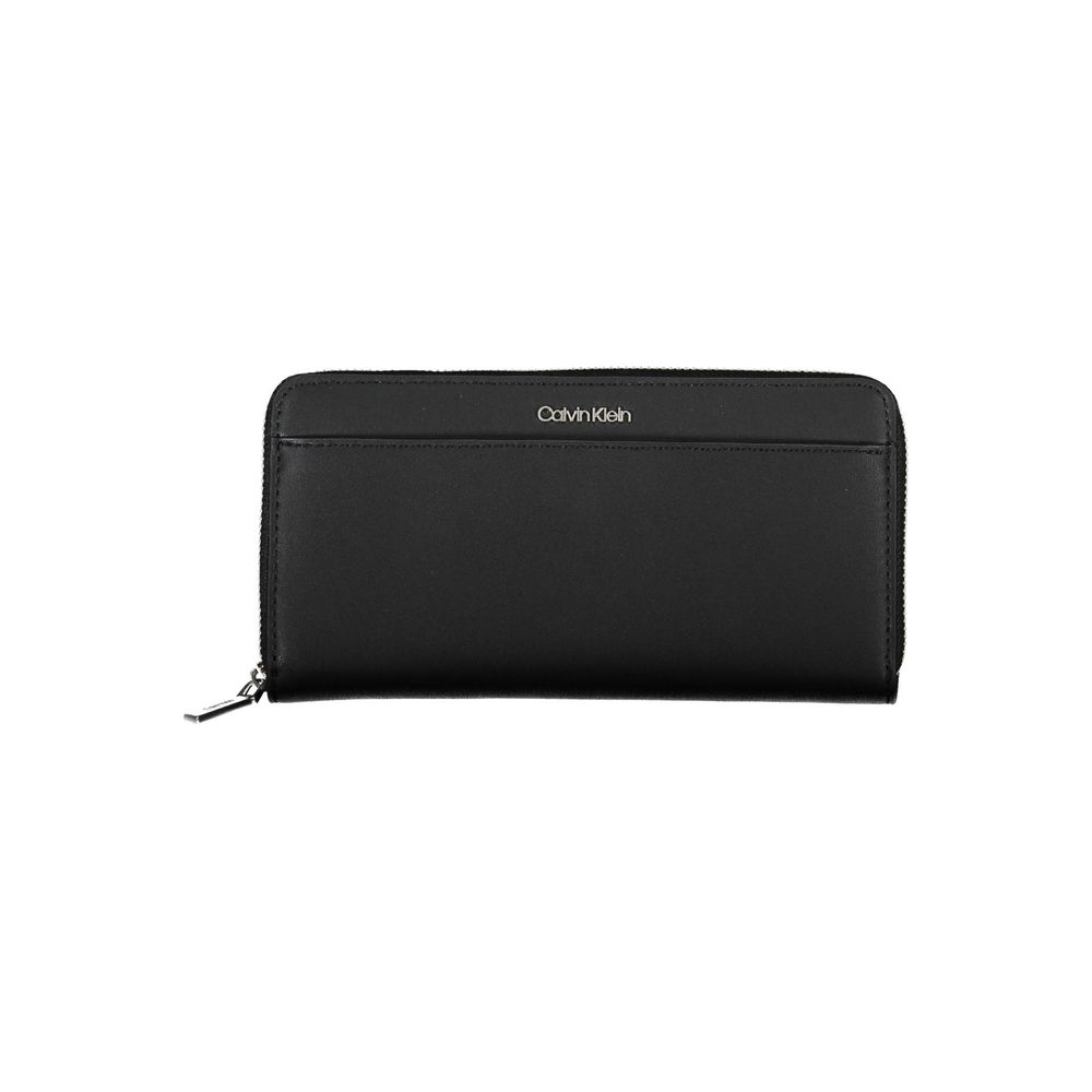 Black Polyethylene Women WalletExperience the epitome of sophistication with the Calvin Klein wallet—an essential accessory for the modern trendsetter. Crafted from 100% polyethylene making it sleek and durable. This wallet boasts 5 roomy compartments and