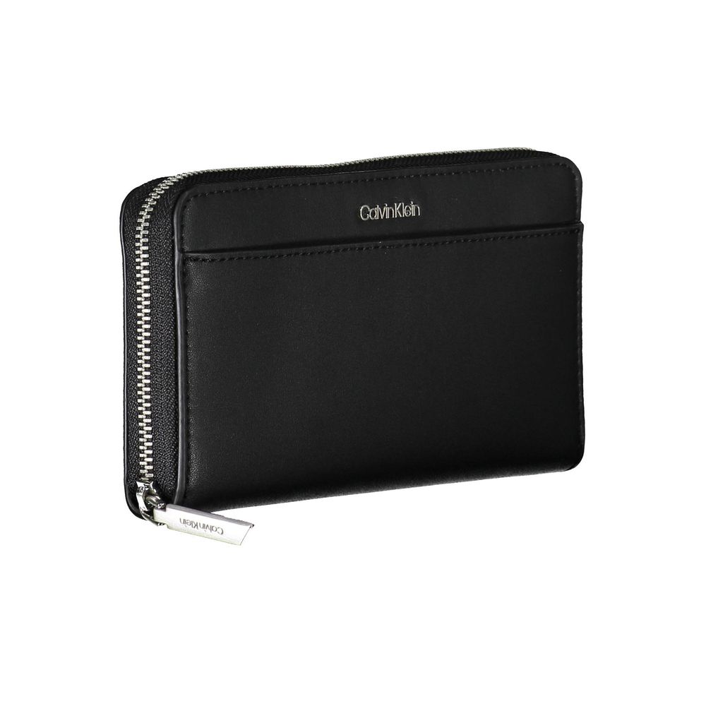 Black Polyethylene Women WalletExperience the epitome of sophistication with the Calvin Klein wallet—an essential accessory for the modern trendsetter. Crafted from 100% polyethylene making it sleek and durable. This wallet boasts 5 roomy compartments and