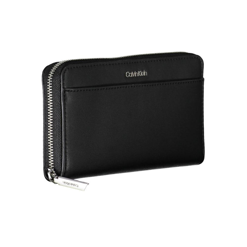 Black Polyethylene Women WalletExperience the epitome of sophistication with the Calvin Klein wallet—an essential accessory for the modern trendsetter. Crafted from 100% polyethylene making it sleek and durable. This wallet boasts 5 roomy compartments and
