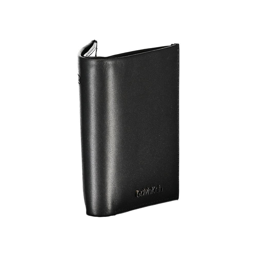 Sleek Black Leather RFID WalletEffortlessly organize your cards and cash with this sleek Calvin Klein wallet, designed for the modern man. Featuring RFID-blocking technology, it offers added security against data theft, while its double card space arrange