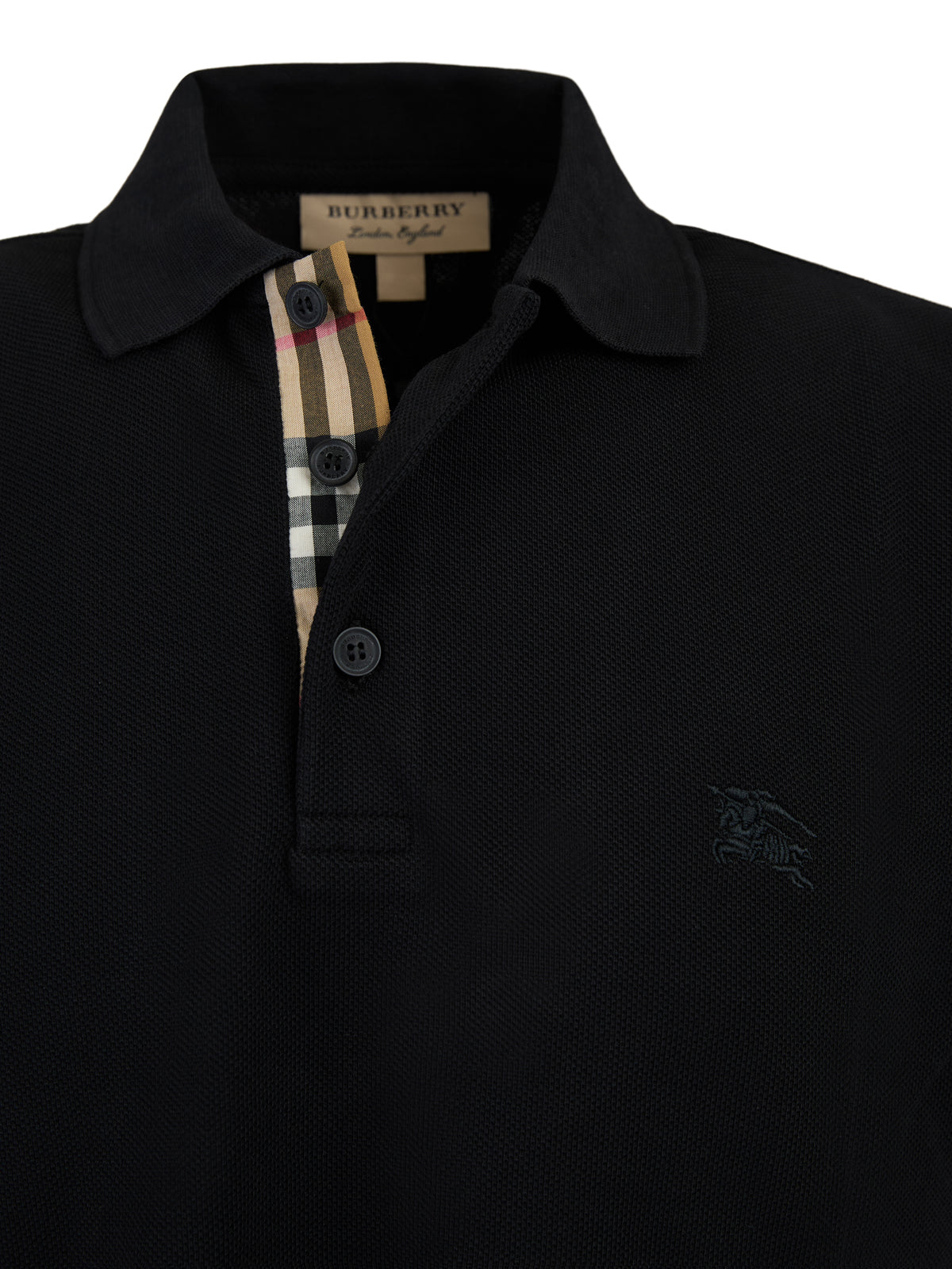 Black Cotton Collared Polo ShirtBURBERRY Gorgeous brand new, Black Cotton Collared Polo Shirt Art#: 8000913 Model: Short sleeve Polo Shirt Colour: Black Material: 100% Cotton Fitting: Regular Fit Logo details Made in ThailandBlack Cotton Collared Polo Shi