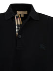 Black Cotton Collared Polo ShirtBURBERRY Gorgeous brand new, Black Cotton Collared Polo Shirt Art#: 8000913 Model: Short sleeve Polo Shirt Colour: Black Material: 100% Cotton Fitting: Regular Fit Logo details Made in ThailandBlack Cotton Collared Polo Shi