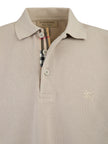 Pale Stone Cotton Collared Polo ShirtBURBERRY Gorgeous brand new, Pale StoneCotton Collared Polo Shirt Art#: 4005899 Model: Short sleeve Polo Shirt Colour: Pale Stone Material: 100% Cotton Fitting: Regular Fit Logo details Made in ThailandPale Stone Cotto