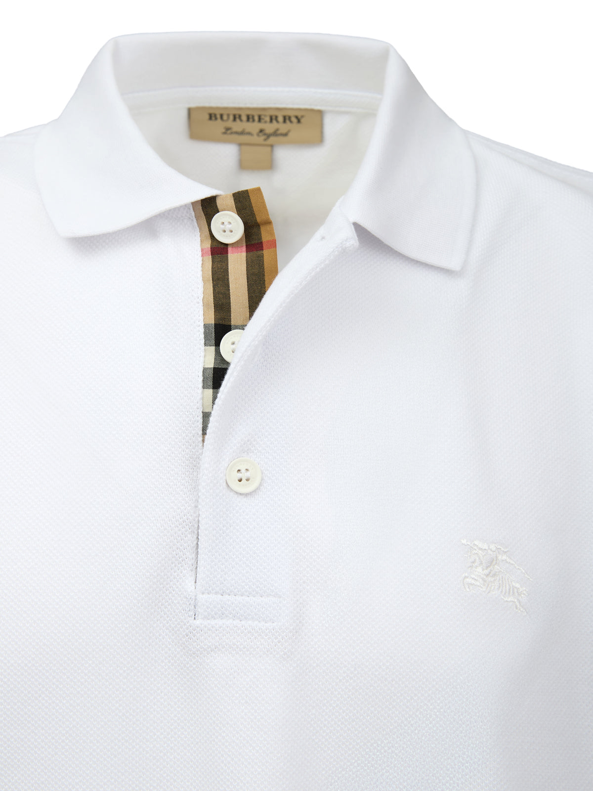 White Cotton Collared Polo ShirtBURBERRY Gorgeous brand new, White Cotton Collared Polo Shirt Art#: 8000919 Model: Short sleeve Polo Shirt Colour: White Material: 100% Cotton Fitting: Regular Fit Logo details Made in ThailandWhite Cotton Collared Polo Shi