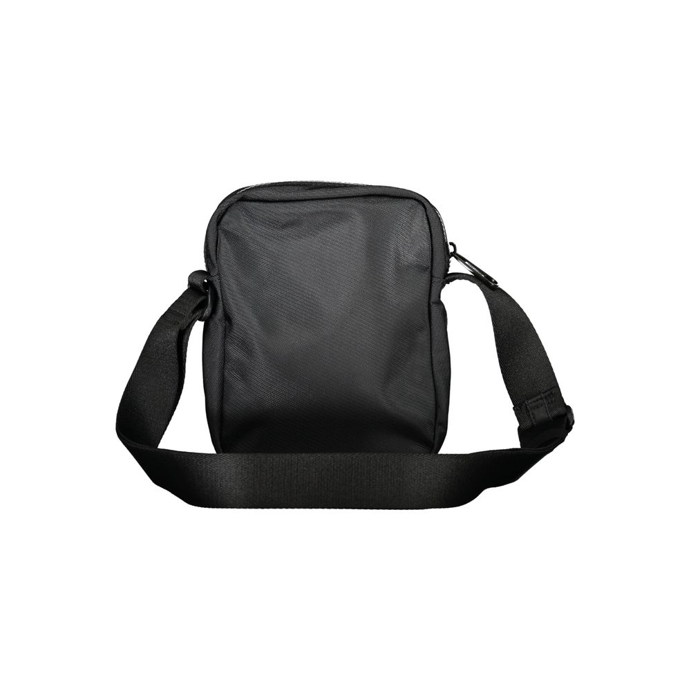 Sleek Black Recycled Shoulder BagDiscover the epitome of eco-chic with the Calvin Klein shoulder bag, crafted for the modern individual who values both style and sustainability. Balance practicality and fashion with this versatile accessory featuring an a