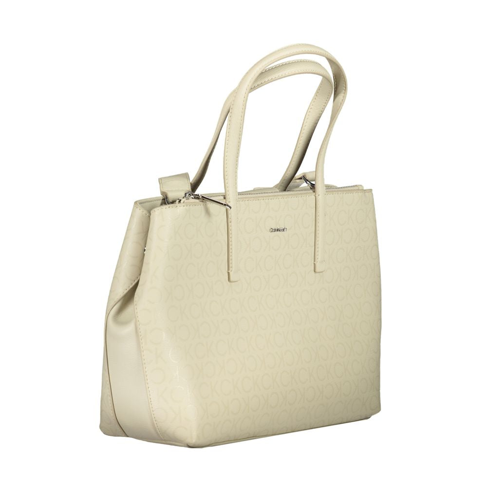 Beige Polyester HandbagBAG 2 HANDLES, ADJUSTABLE AND REMOVABLE SHOULDER STRAP, 1 EXTERNAL POCKET, 1 INTERNAL DOCUMENT POCKET, CONTRASTING DETAILS, ZIP AND AUTOMATIC CLOSURE, LOGO, 50% RECYCLED POLYESTERBeige Polyester Handbag${tagsCalvin KleinAulae Beige