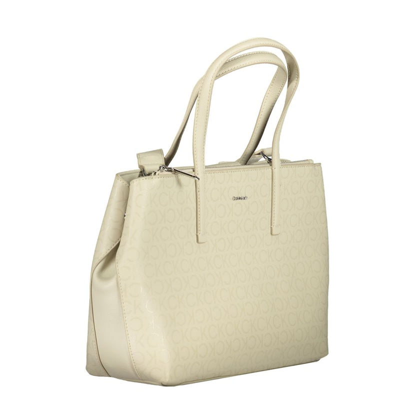 Beige Polyester HandbagBAG 2 HANDLES, ADJUSTABLE AND REMOVABLE SHOULDER STRAP, 1 EXTERNAL POCKET, 1 INTERNAL DOCUMENT POCKET, CONTRASTING DETAILS, ZIP AND AUTOMATIC CLOSURE, LOGO, 50% RECYCLED POLYESTERBeige Polyester Handbag${tagsCalvin KleinAulae Beige
