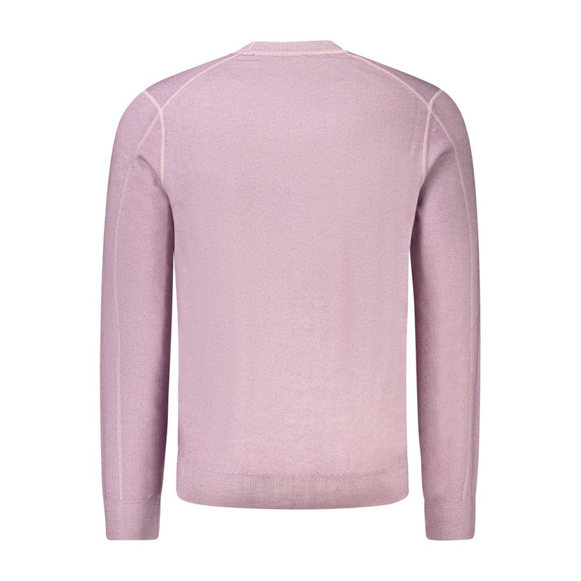Purple Wool Men SweaterStep into the realm of sophistication with this Hugo Boss long-sleeved t-shirt. Crafted with the finest 100% wool, this crew neck marvel boasts sleek embroidery that showcases the iconic logo in a statement of pure luxury. Its rich