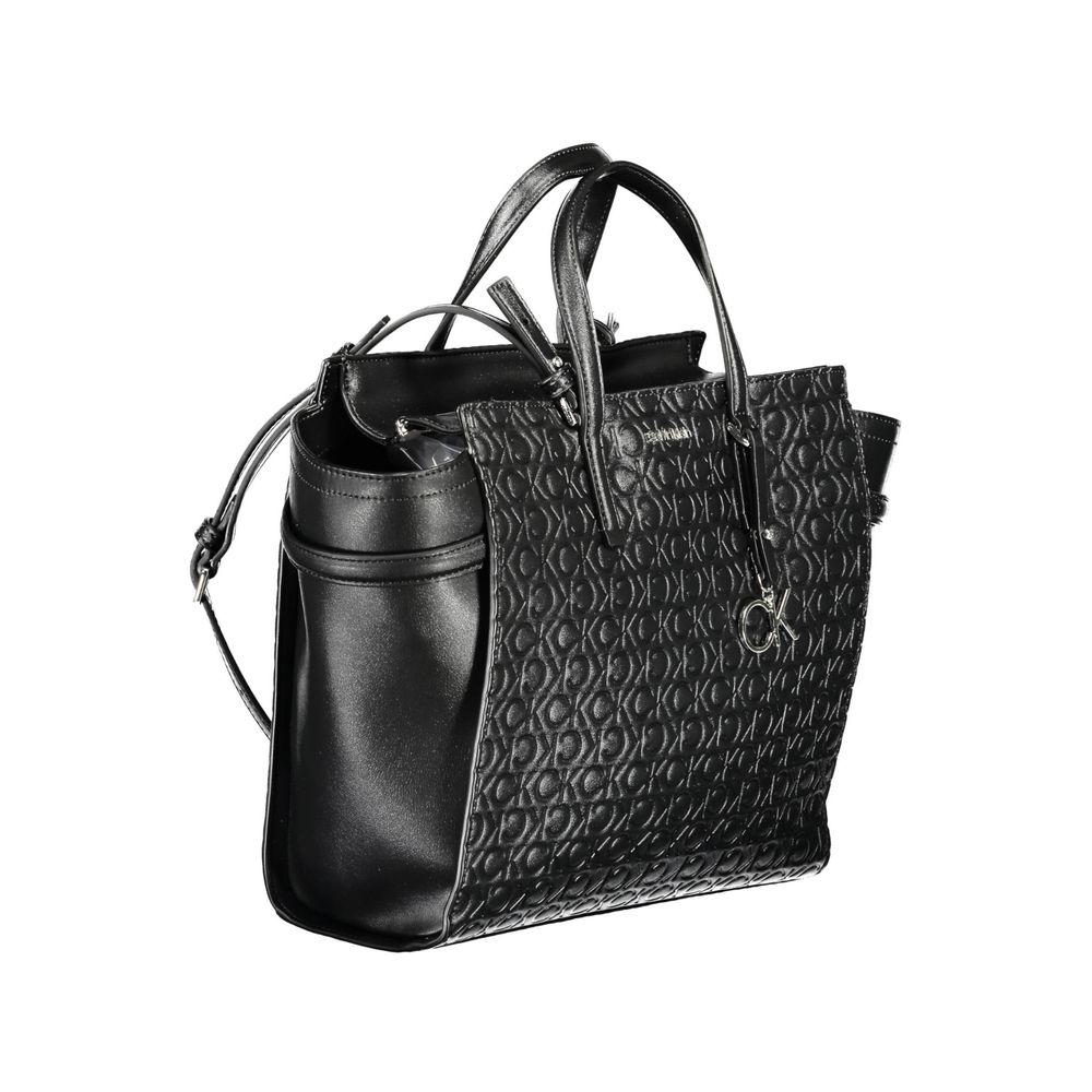 Black Polyester Women HandbagDive into sustainable luxury with Calvin Klein’s impeccable 2 Handle Bag, designed to make a statement while being kind to the planet. Featuring a sleek black hue adorned with striking contrasting details, this accessory is cr
