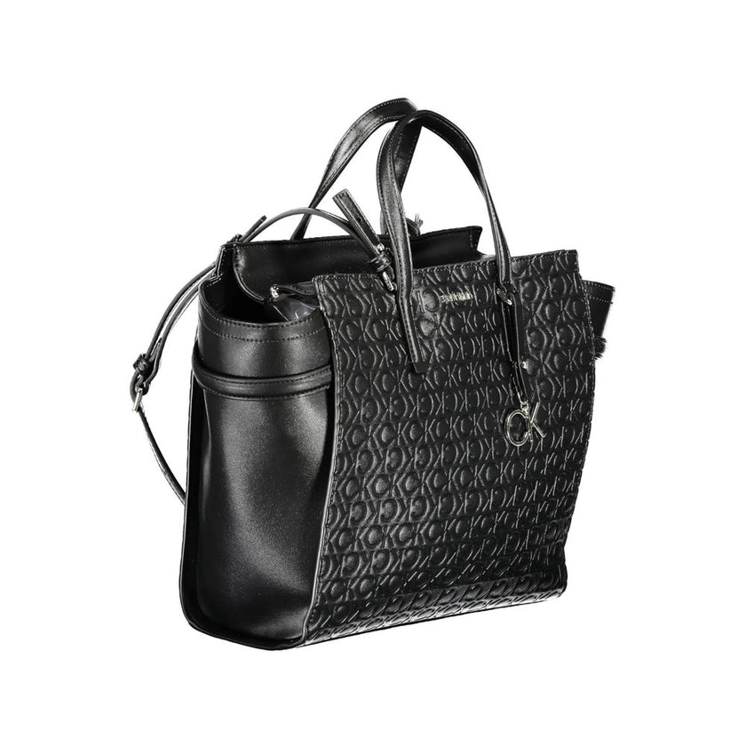 Black Polyester Women HandbagDive into sustainable luxury with Calvin Klein’s impeccable 2 Handle Bag, designed to make a statement while being kind to the planet. Featuring a sleek black hue adorned with striking contrasting details, this accessory is cr