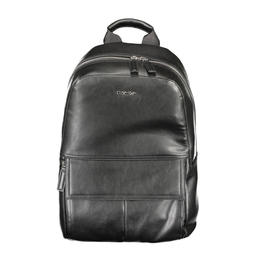 Black Polyester Men BackpackElevate your on-the-go style with the Calvin Klein Backpack, designed for the modern urban explorer. Featuring a sleek black exterior, this backpack is crafted with practicality and superior design in mind. The one handle and c