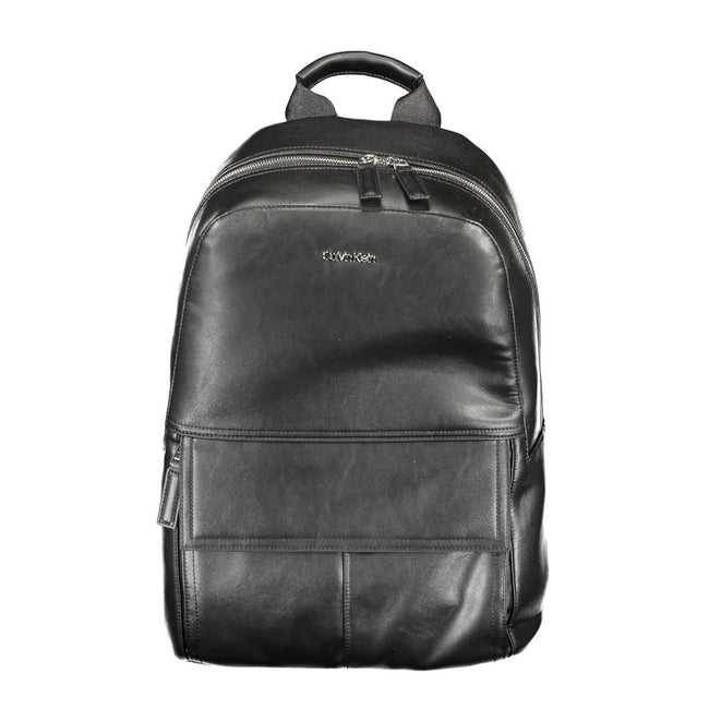 Black Polyester Men BackpackElevate your on-the-go style with the Calvin Klein Backpack, designed for the modern urban explorer. Featuring a sleek black exterior, this backpack is crafted with practicality and superior design in mind. The one handle and c