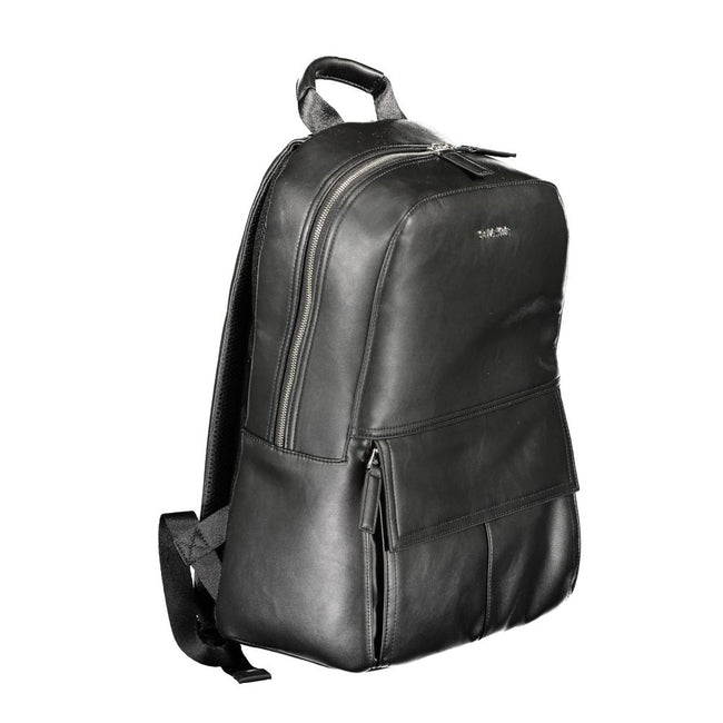 Black Polyester Men BackpackElevate your on-the-go style with the Calvin Klein Backpack, designed for the modern urban explorer. Featuring a sleek black exterior, this backpack is crafted with practicality and superior design in mind. The one handle and c