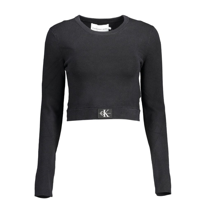 Black Lyocell Women SweaterElevate your wardrobe with the epitome of sleek sophistication: the Calvin Klein long-sleeved shirt. Meticulously crafted with a blend of elastane, lyocell, and polyamide, this piece offers a luxurious feel with just the right a