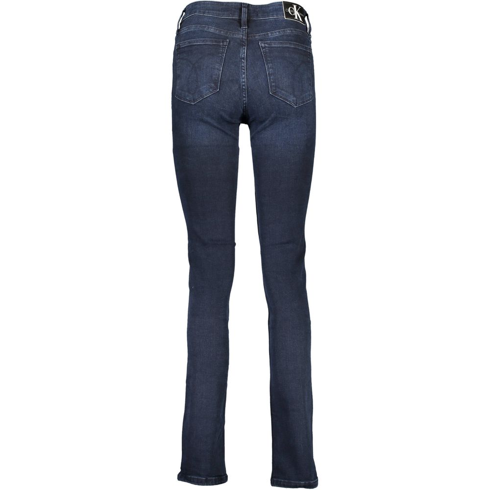 Blue Cotton Women JeansStep into the epitome of sleek sophistication with these Calvin Klein slim jeans. Meticulously crafted to flatter your silhouette, these jeans feature a contemporary 5-pocket design, complete with the iconic Calvin Klein logo for an