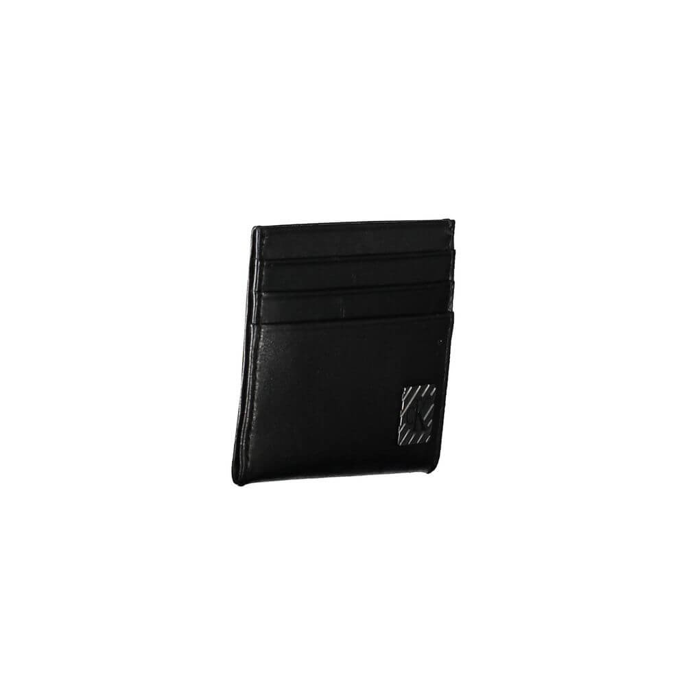 Black Leather Men WalletDare to define your pocket prestige with this sleek Calvin Klein cardholder. Crafted from 100% pure leather, it promises durability and sophistication with every use. This quintessential accessory, complete with the iconic Calvin K