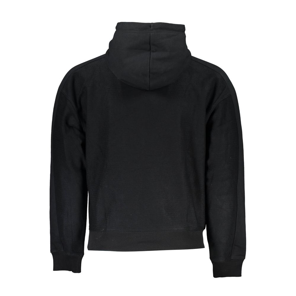 Black Cotton Men SweaterElevate your wardrobe with the sleek sophistication of a Calvin Klein masterpiece. This black hoodie exudes an air of effortless style, featuring a bold print and striking, contrasting details that catch the eye. Emblazoned with th