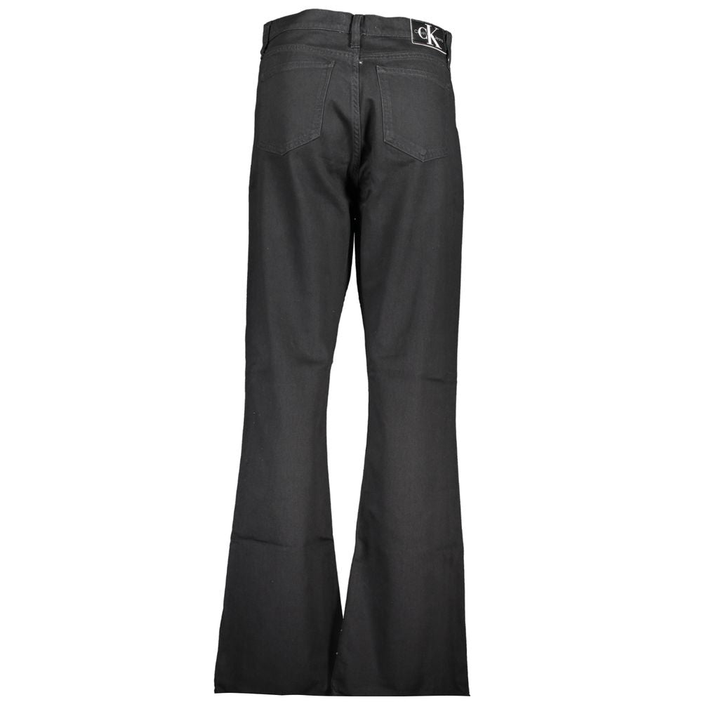 Black Cotton Women JeansIndulge in the timeless sophistication of Calvin Klein with these authentic boot jeans, designed to accentuate your silhouette with a hint of urban elegance. Crafted from a premium blend that includes 20% organic cotton, these jean