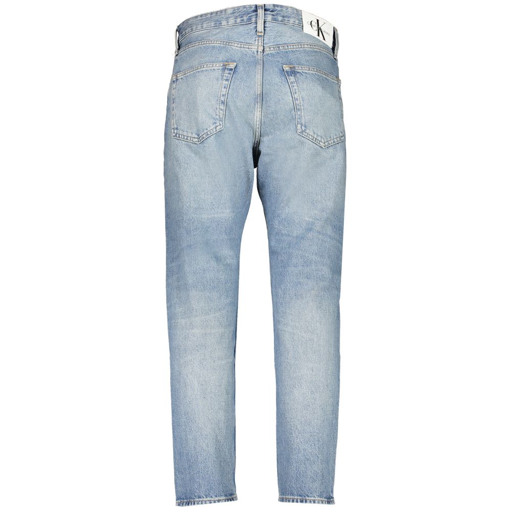 Blue Cotton Men JeansStep into the epitome of cool confidence with these authentic Calvin Klein Dad Jeans, designed for the daring and stylish. Meticulously crafted with 20% recycled cotton, they boast a washed effect for that perfect lived-in look. Top-n