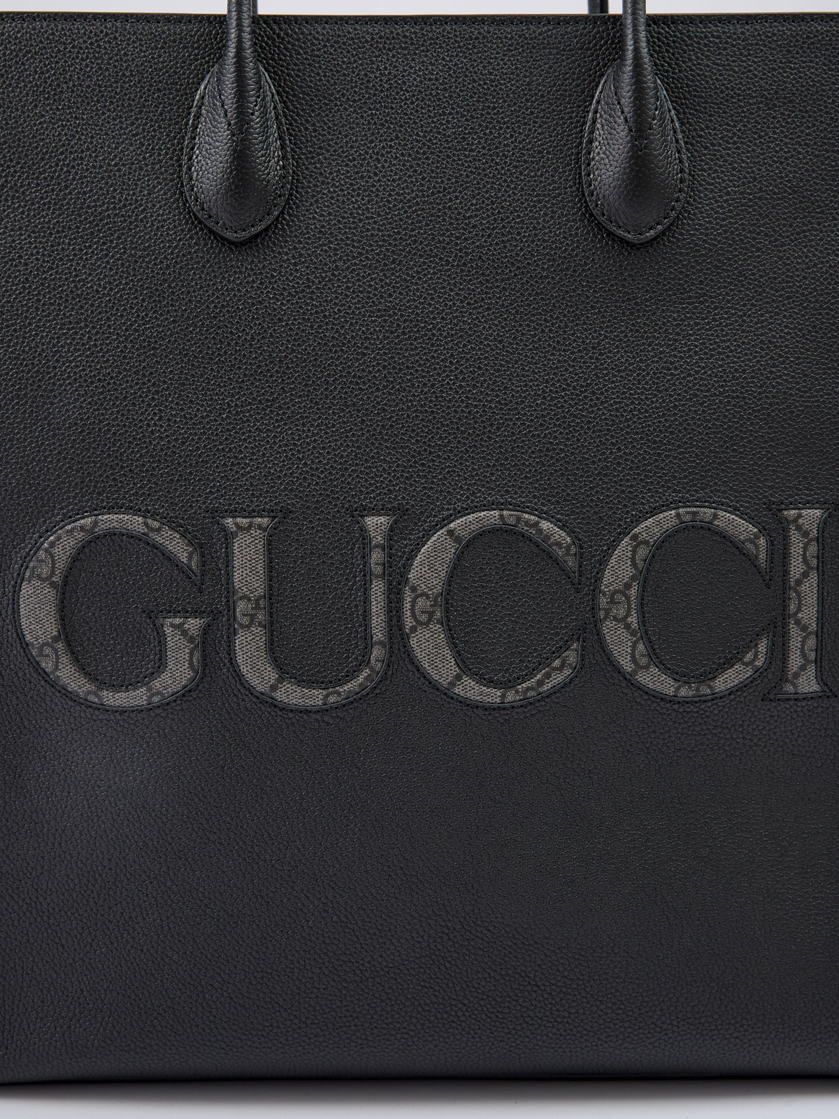 Black Leather Logo Medium Tote BagGUCCI Gorgeous brand new, 100% Authentic Gucci women’s Black Leather Logo Medium Tote Bag. Model: Tote Bag Color: Black Material: 100% Leather 120cm removable and adjustable shoulder strap. One internal compartment with o
